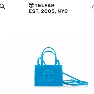 Cyan small shopping bag.